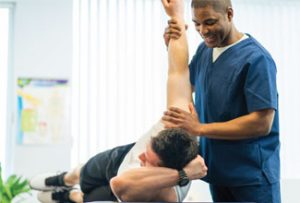 Physical / Occupational Therapist treating patient