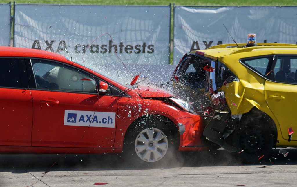 Two cars crashing together at high velocity